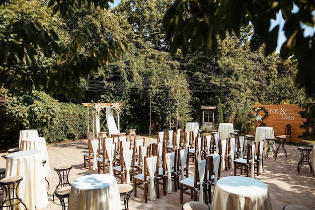 Free Photo decorated wedding aisle for marriage ceremony in a garden.