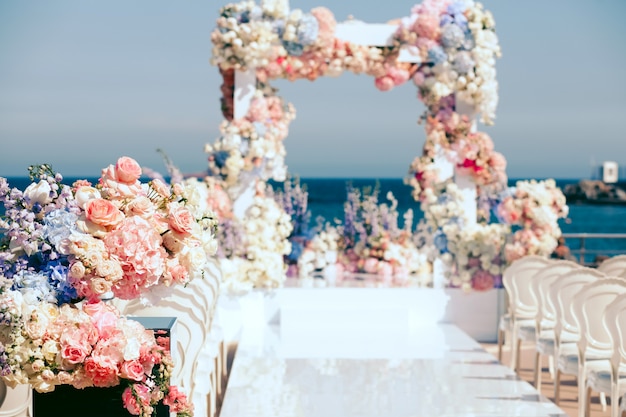 Free Photo decorated with flowers exit wedding ceremony and archway