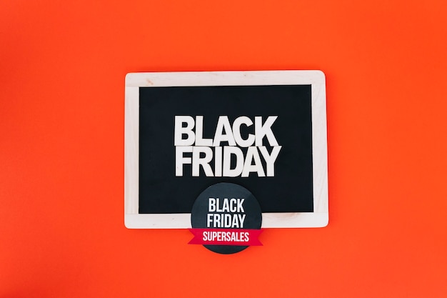 Free photo decoration for black friday with label on slate