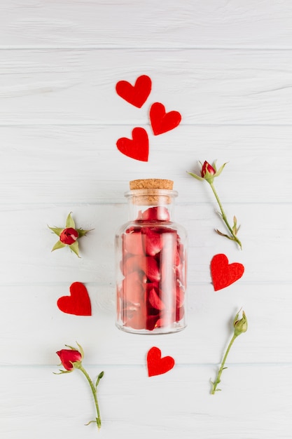 Decorative bottle filled with rose petals