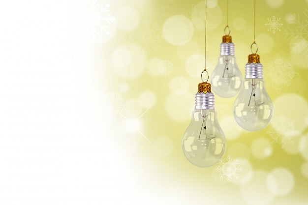 Free photo decorative bulbs hanging with bokeh effect