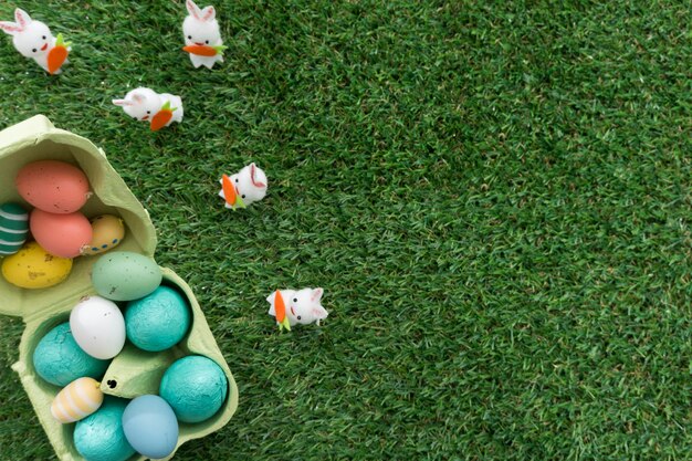 Decorative carton of eggs with rabbits for easter day