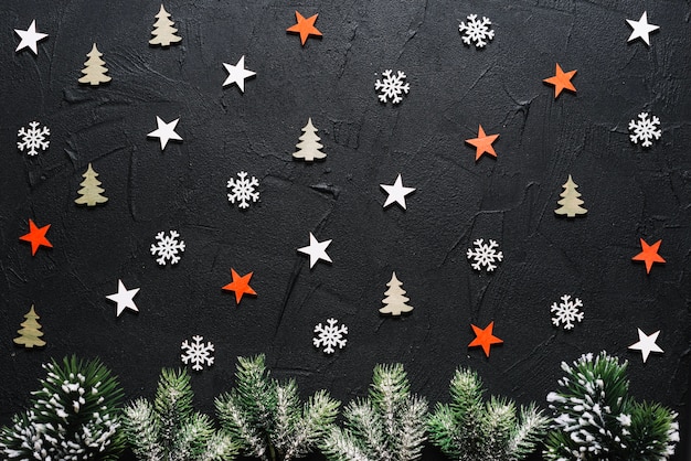 Free photo decorative christmas background with fir, stars and trees