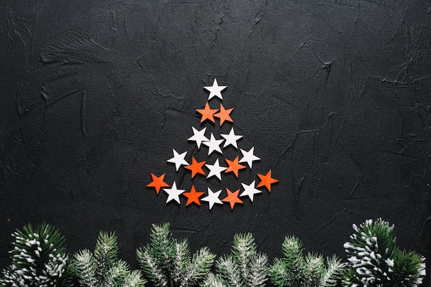 Free Photo decorative christmas background with stars forming tree