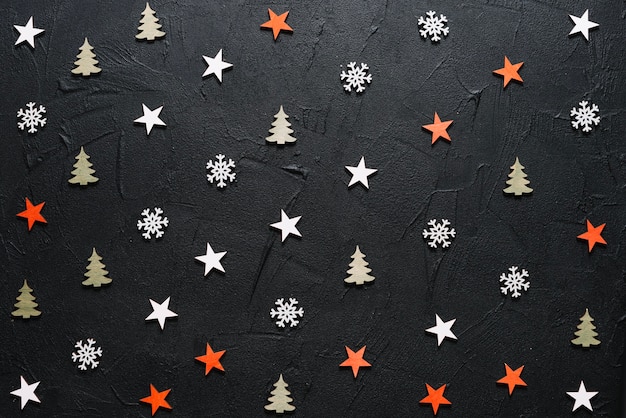 Free photo decorative christmas background with stars and trees