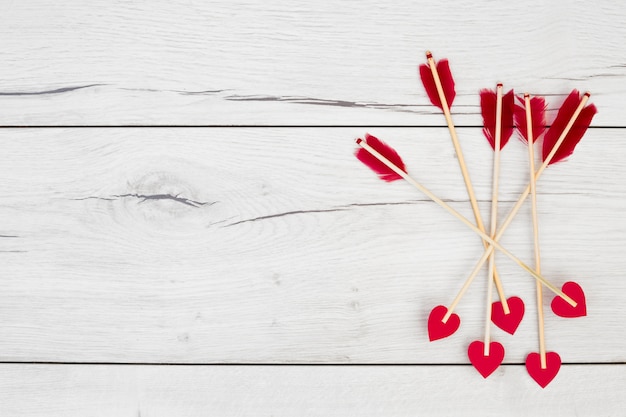 Decorative feathers on wands with little hearts