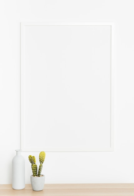 Decorative plant with empty frame