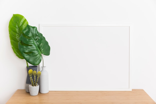 Free Photo decorative plant with empty frame