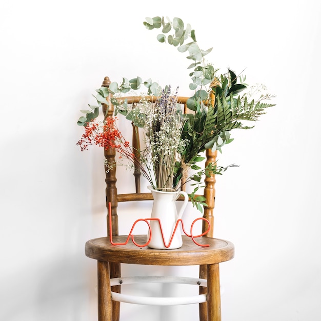 Free Photo decorative plants on chair