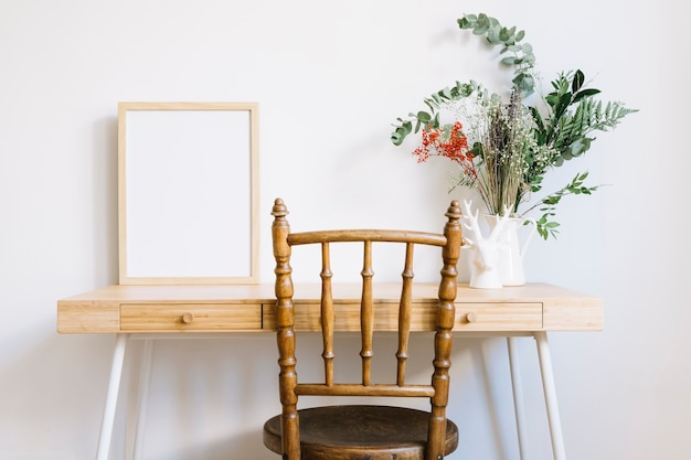 Decorative table with frame and plant