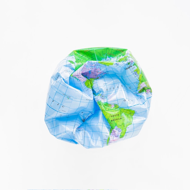 Free Photo deflated ball with earth map