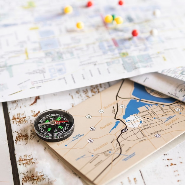 Free photo defocused background map with old map on front