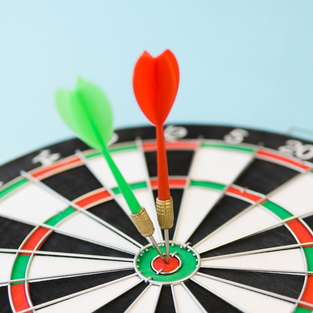 Free Photo defocused dart board with darts