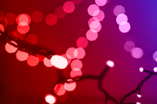 Free Photo defocused fairy lights on red