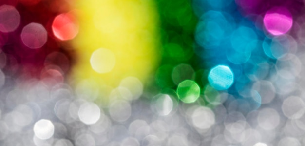 Defocused sparkling rainbow glitter