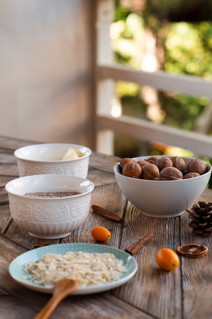 Defocused view ofcake ingredients with walnuts