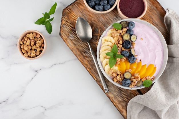 Delicious açai bowl arrangement with copy space