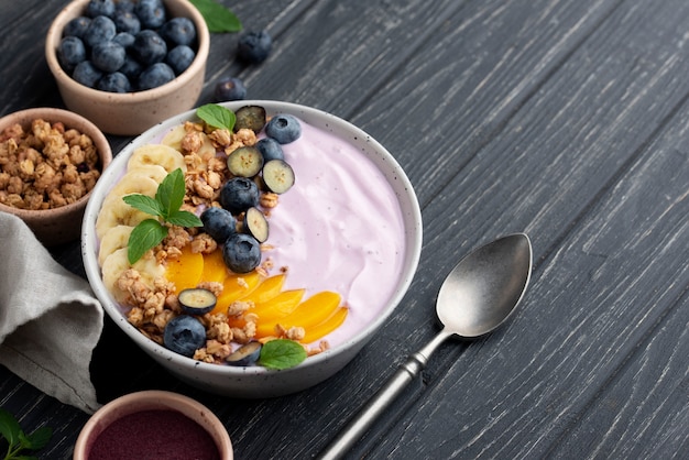 Delicious açai bowl arrangement with copy space