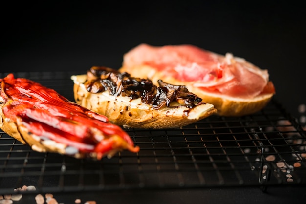 Delicious assortment of bruschetta close up