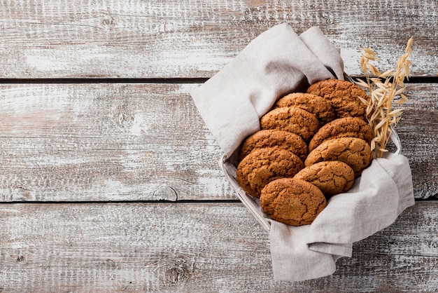 Free Photo delicious baked cookies in basket and cloth