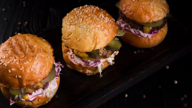 Delicious beef burgers with lettuce ready to be served