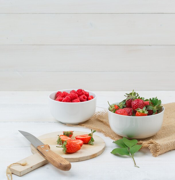 Delicious berries on the wooden table