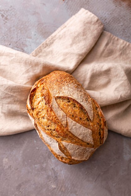 Delicious bread on towel to view