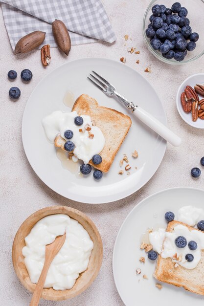 Delicious breakfast with yogurt and toast