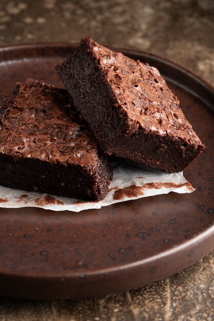 Delicious brownies arrangement on plate