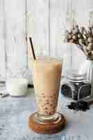 Free photo delicious bubble tea cup with straw