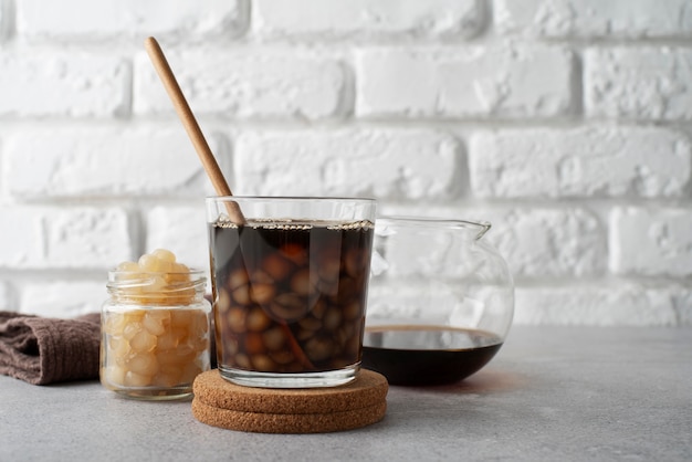 Delicious bubble tea drink on table