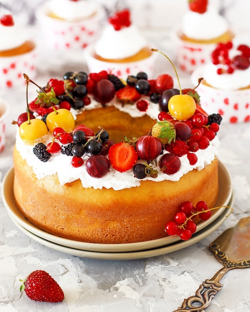 Delicious bundt cake with berries close-up