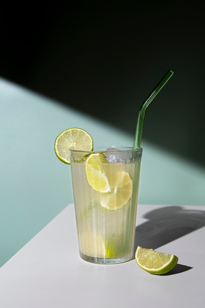 Delicious caipirinha cocktail with straw