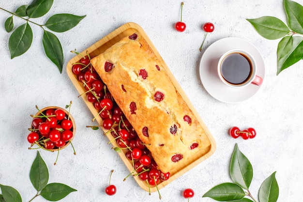 Delicious cherry cake with fresh cherries,top view