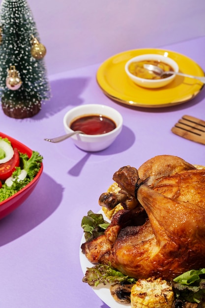 Free photo delicious chicken and salad arrangement high angle