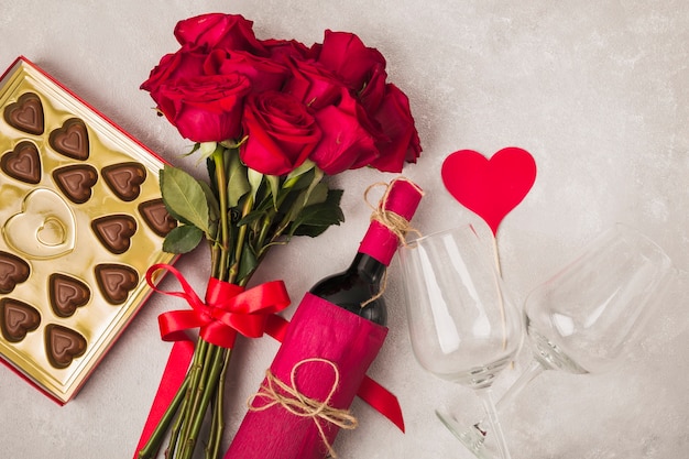 Delicious chocolate wine and bouquet of roses