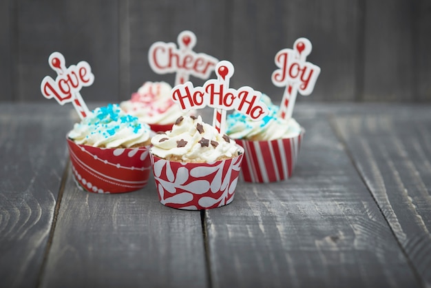 Free photo delicious christmas muffins on wood