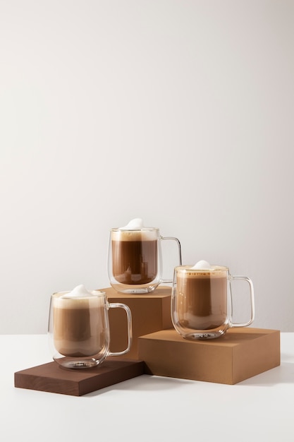 Delicious coffee cups with foam assortment