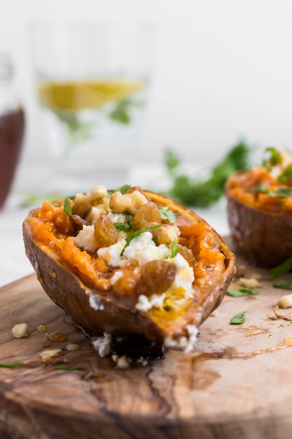 Free Photo delicious cooked potatoes on wooden board