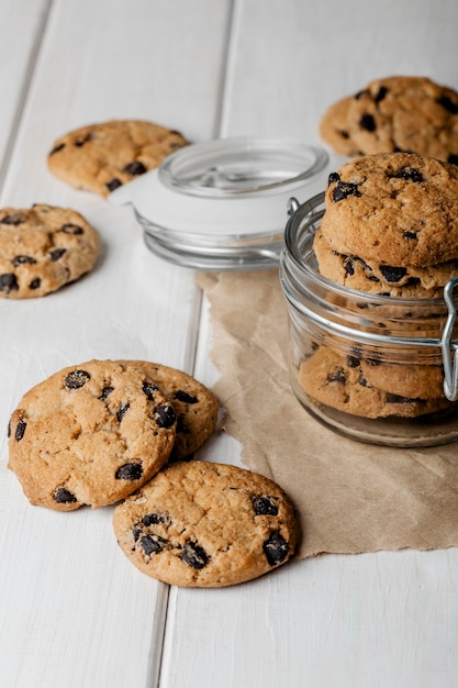 Delicious cookies jar on table