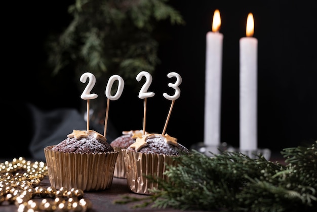 Delicious cupcakes and candles arrangement