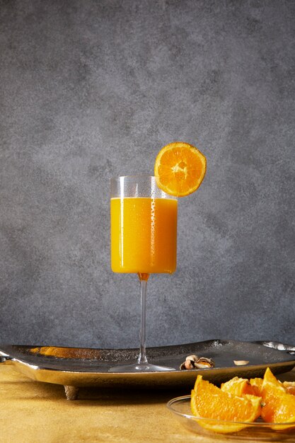 Delicious daiquiri cocktail with orange slice