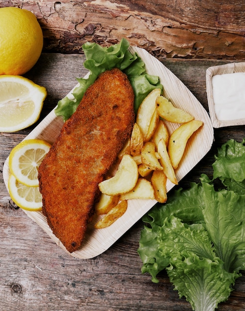 Free photo delicious fish fillet with french fries