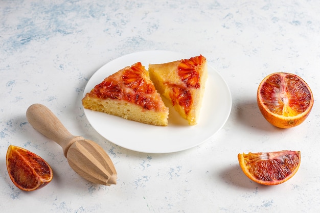 Delicious french dessert tart tatin with blood orange.