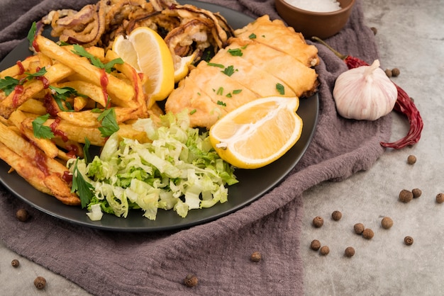 Delicious french fries salad and meat