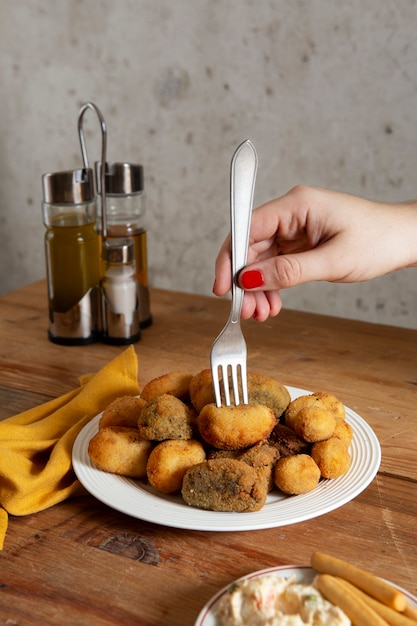 Free Photo delicious fried croquette assortment