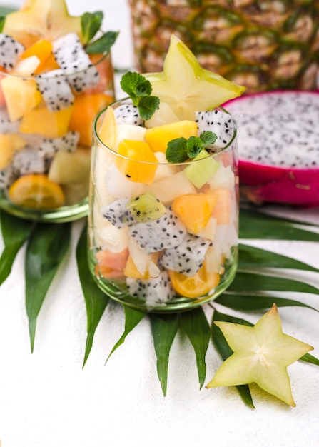 Free photo delicious fruit salad in glasses