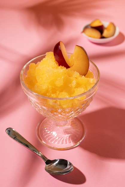 Free photo delicious granita dessert with fruit slice