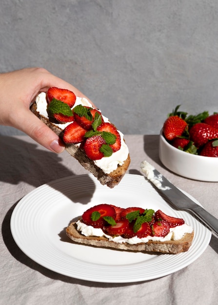 Free Photo delicious healthy dessert with strawberry arrangement