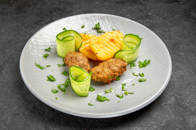 Delicious homemade cutlet meal along with potatoes